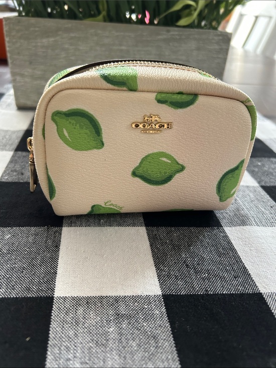 Coach Handbags - Coach Cream Cosmetic Pouch with Green Lime Print